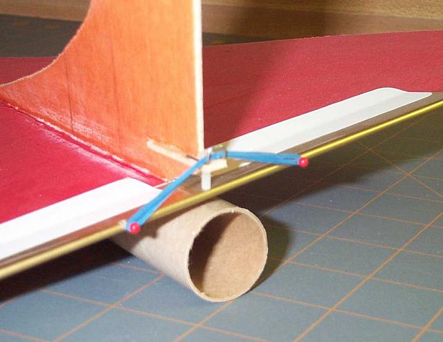 With rubber band installed and in glide position.