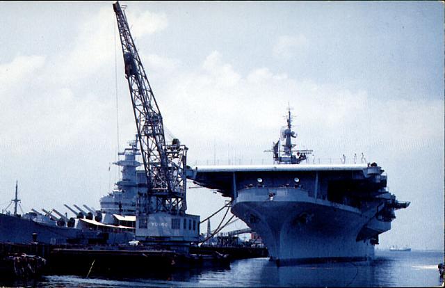 CVB-41 at Norfolk next to a BB - Date Unknown