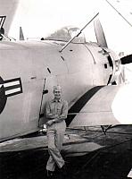 Chuck Muhl with his plane 505