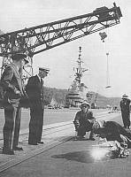 1959 - Welders Patch Midway's Stadium-size Flight Deck in a Yokosuka Yard