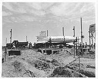 Pushover was conducted about two years after Sandy, in the 1948 - 1949 time frame.