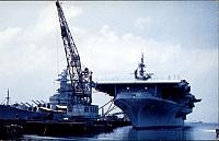 CVB-41 at Norfolk next to a BB - Date Unknown