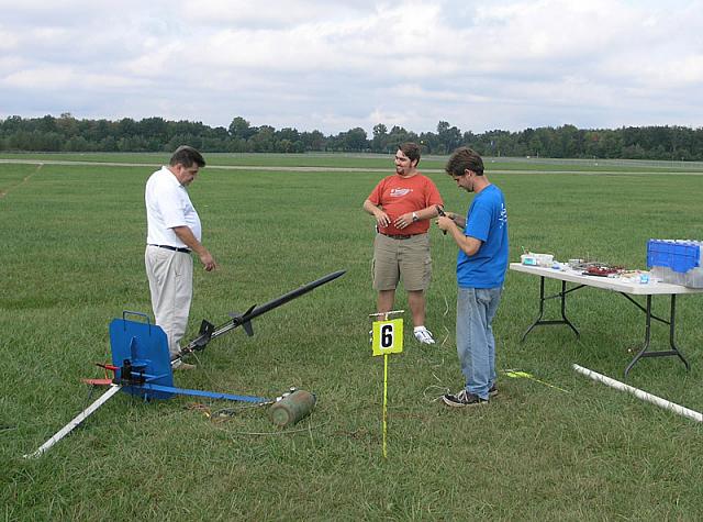 Art Upton, Dan Griswold, and Scott Miller prepare Dan's hybrid
