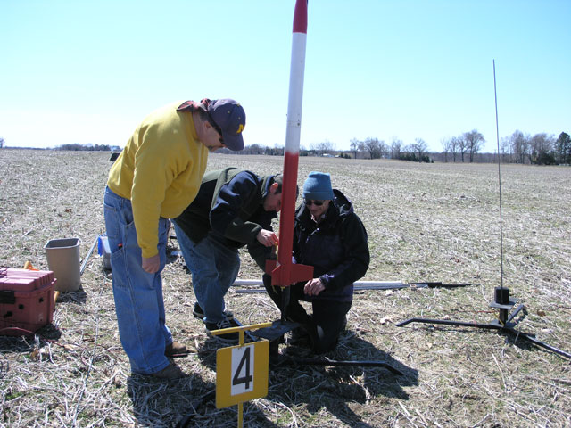Dale, Scott, and Tony testing a switch for the club project