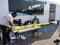 Eldred works on his staged Crayon-roc. Chris gives moral support