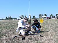 Jerry Kraus and nephew Josh Barber from Pittsburgh prep their V-2. Jerry and Josh flew many super nice rockets over the weekend.