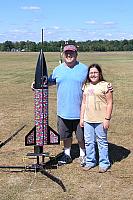 Steve and Emma Kristal next to Steve's Warlock