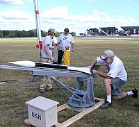 Ed preps his L1 attempt ASP on a scale launcher. The launch is motor driven. Too Cool!